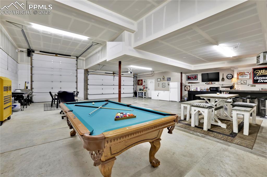 Image 33 of 36: Attached garage RV parking and hookups