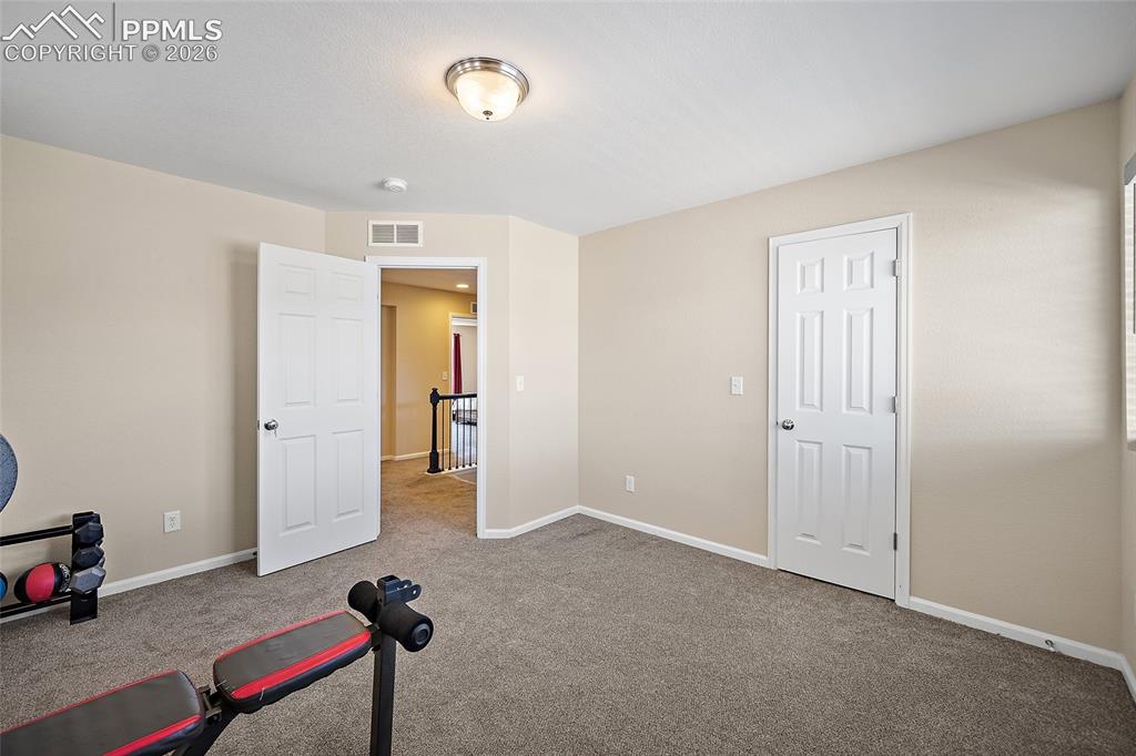 Image 21 of 40: Secondary Bedroom