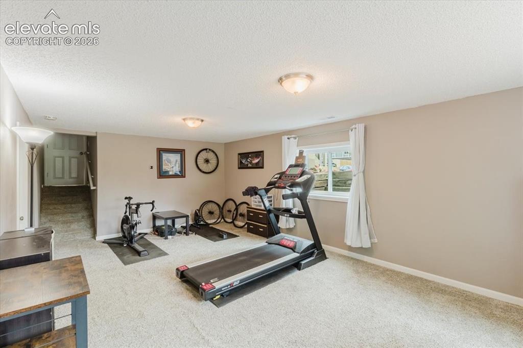 Image 22 of 49: Basement family room