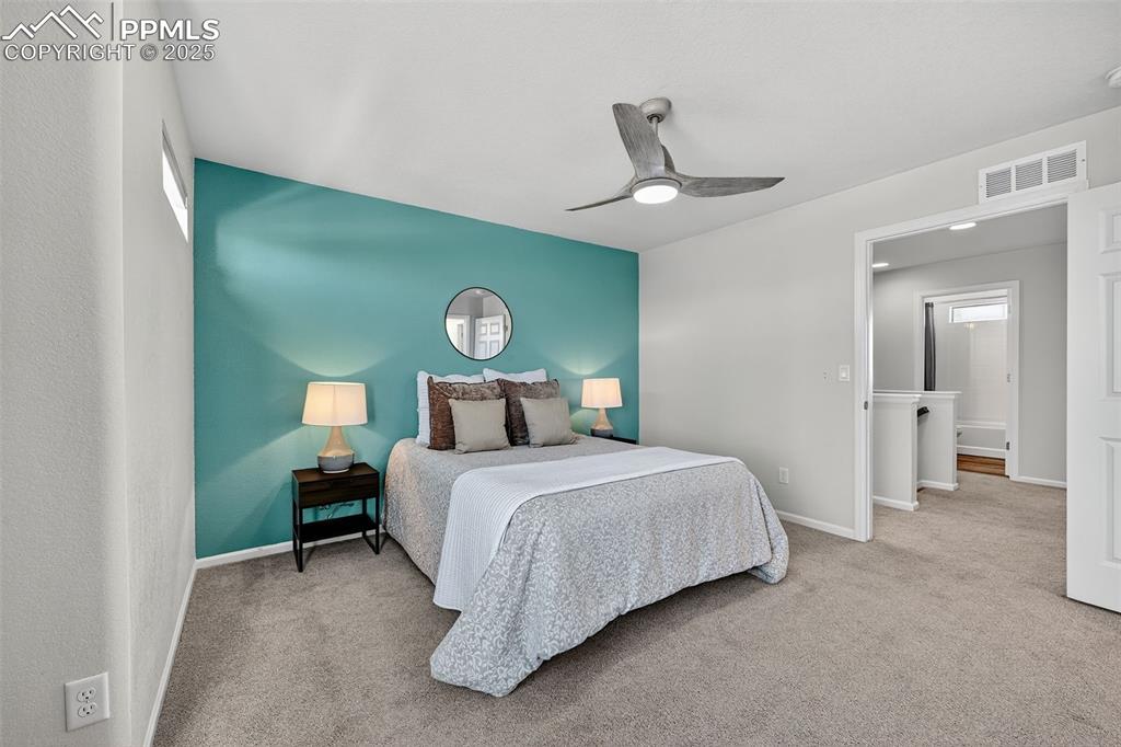 Image 12 of 32: UPPER LEVEL PRIMARY BEDROOM