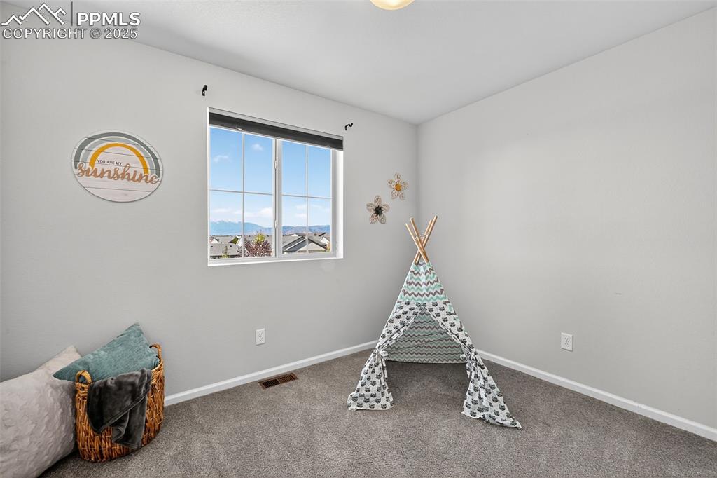 Image 18 of 32: UPPER LEVEL 2ND BEDROOM