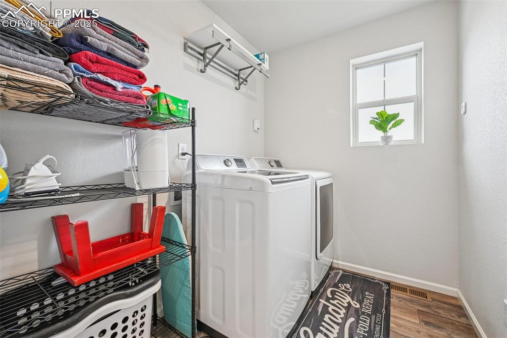 Image 20 of 32: CONVENIENTLY LOCATED UPPER LEVEL LAUNDRY ROOM