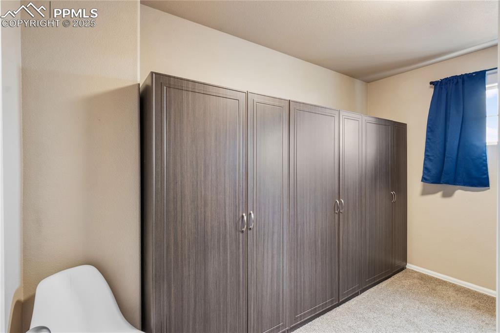 Image 20 of 38: Closet