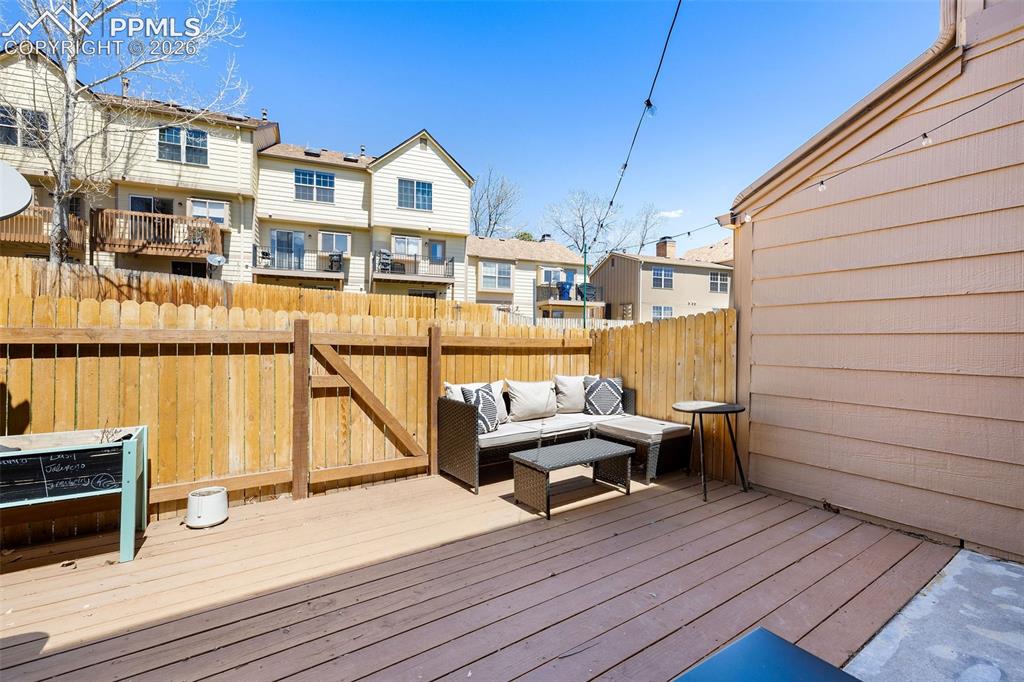Image 25 of 26: Decked patio space featuring composite decking