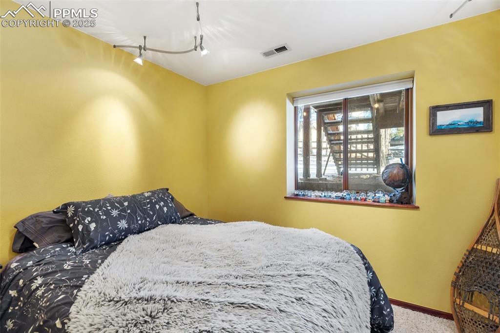 Image 24 of 34: Bedroom - Basement