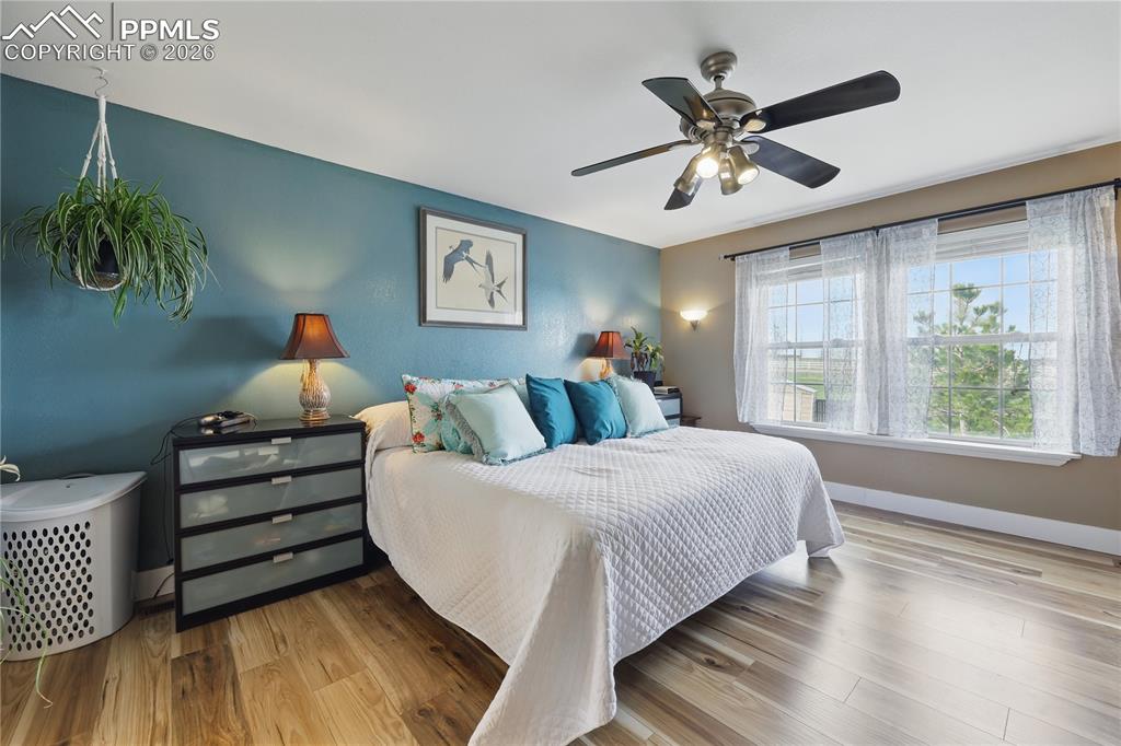 Image 13 of 43: Main-level primary suite offers a peaceful retreat with a luxurious 5-piece