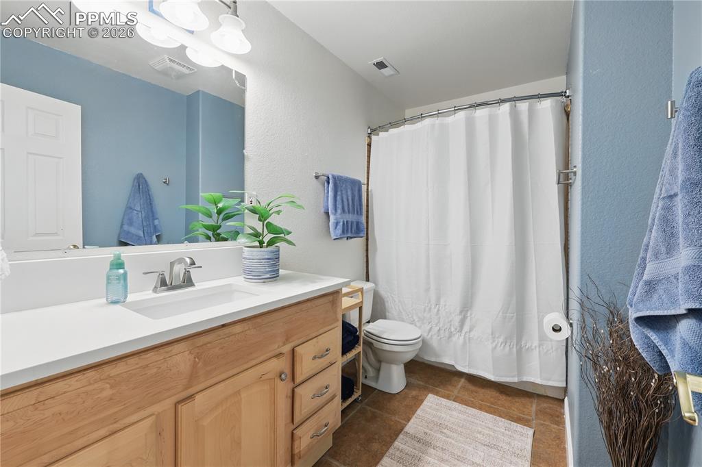 Image 26 of 43: Basement full bathroom.