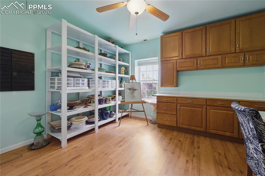 Image 27 of 43: Basement Bedroom / Craft Room (with closet).