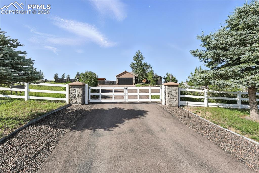 Image 41 of 43: Fully fenced property with fenced pastures and horse paddocks.