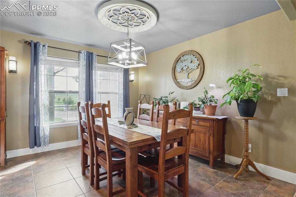 Image 6 of 43: Main level dining room.