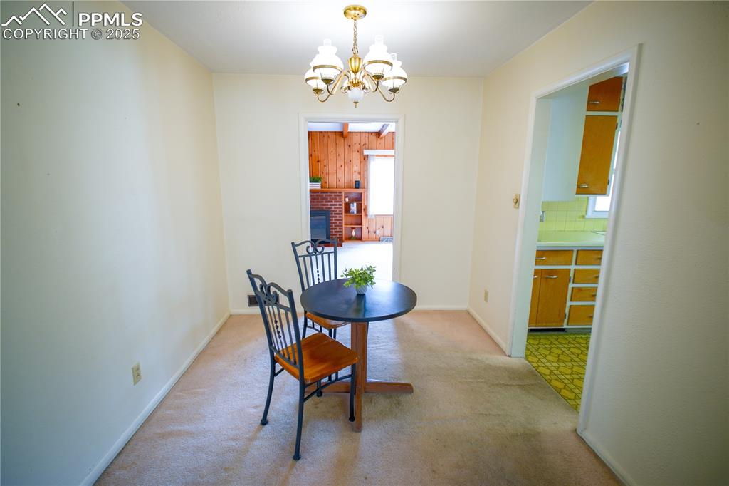 Image 6 of 28: The dining area is open to all main areas and convenient to the kitchen see