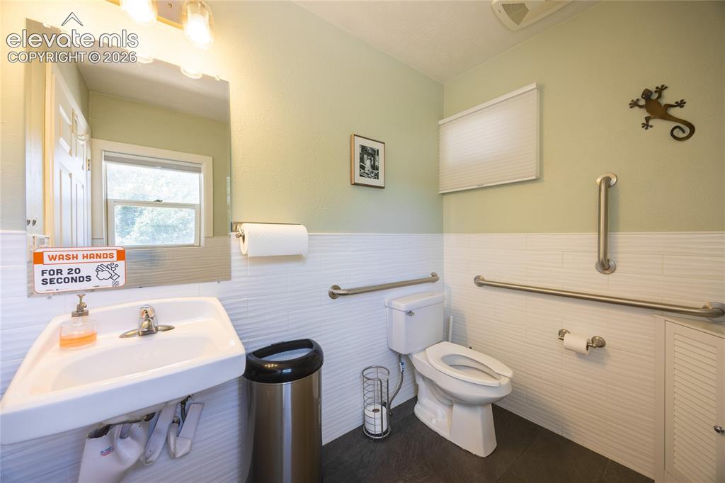 Image 12 of 35: ADA bathroom on main level