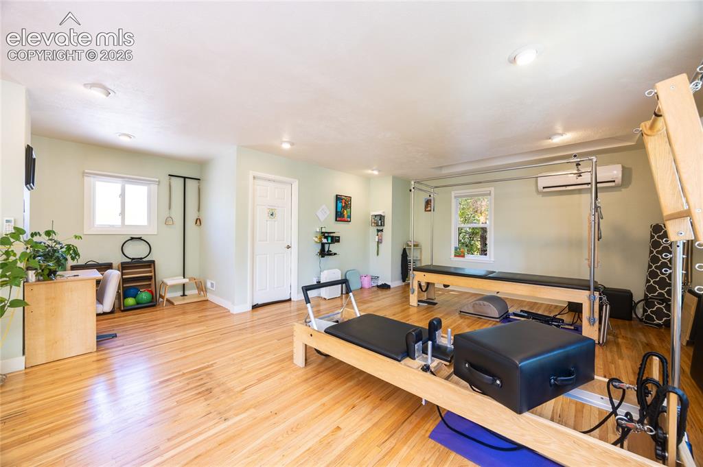 Image 8 of 35: Open, bright space for a fitness user or bullpen office or showroom