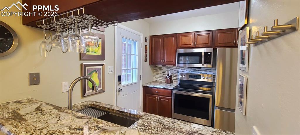 Image 7 of 47: 2 year old stainless steel appliances