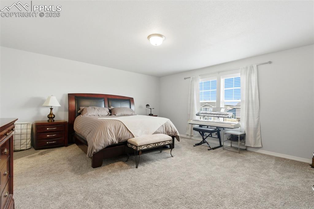 Image 19 of 47: Primary bedroom upstairs