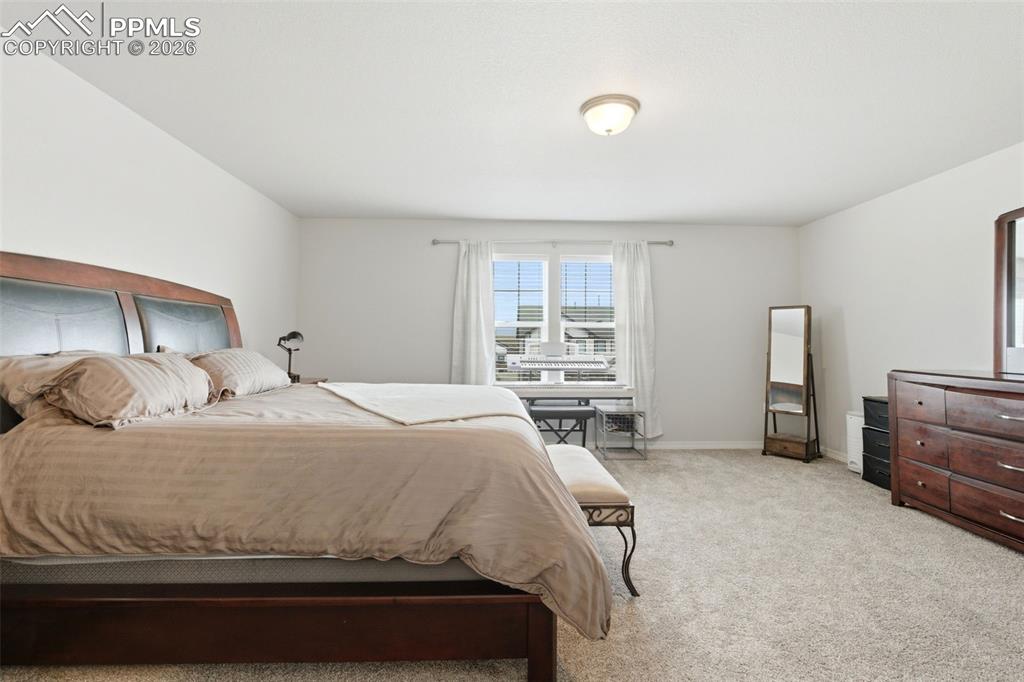 Image 20 of 47: Primary bedroom upstairs