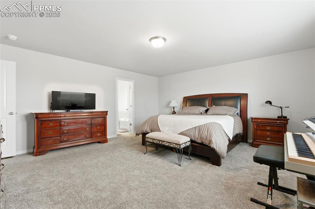 Image 21 of 47: Primary bedroom upstairs