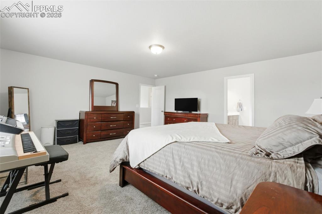 Image 22 of 47: Primary bedroom upstairs