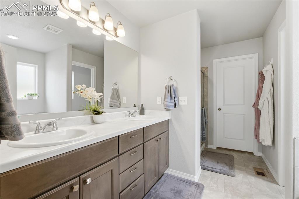 Image 23 of 47: Primary bathroom 