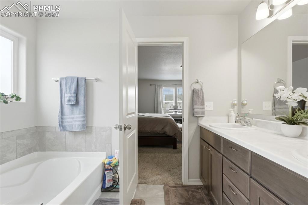 Image 24 of 47: Primary bathroom 