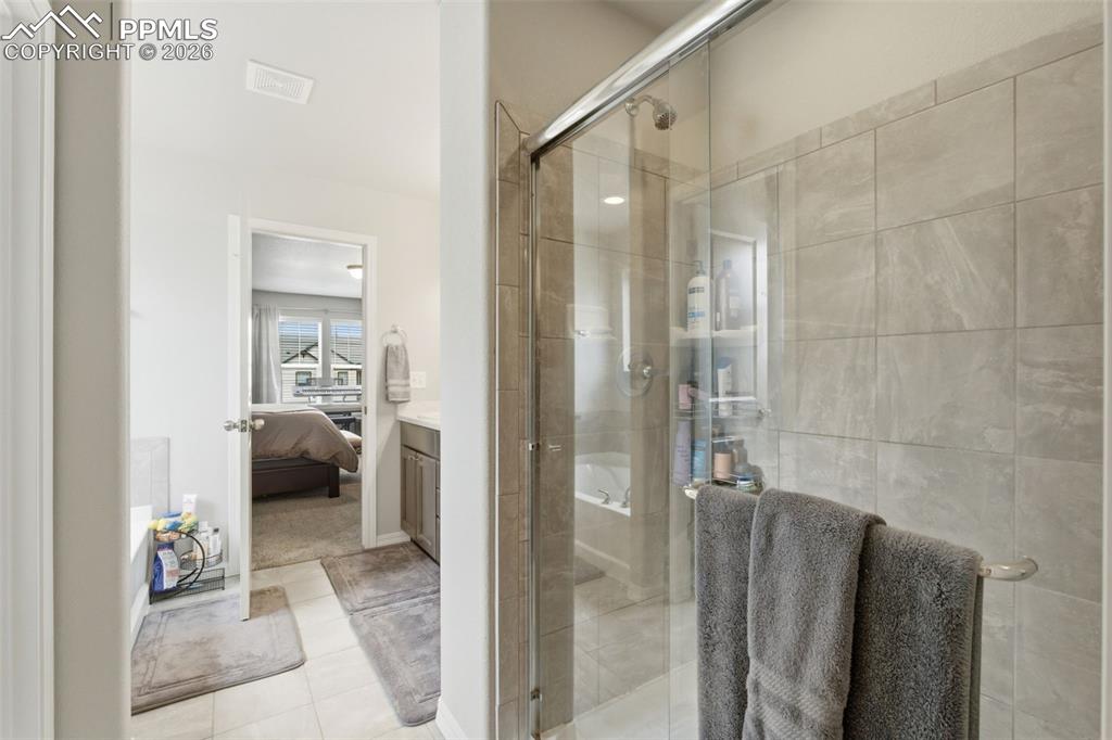 Image 25 of 47: Primary bathroom 