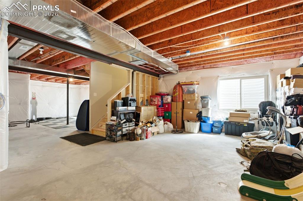 Image 34 of 47: Spacious unfinished basement for expansion