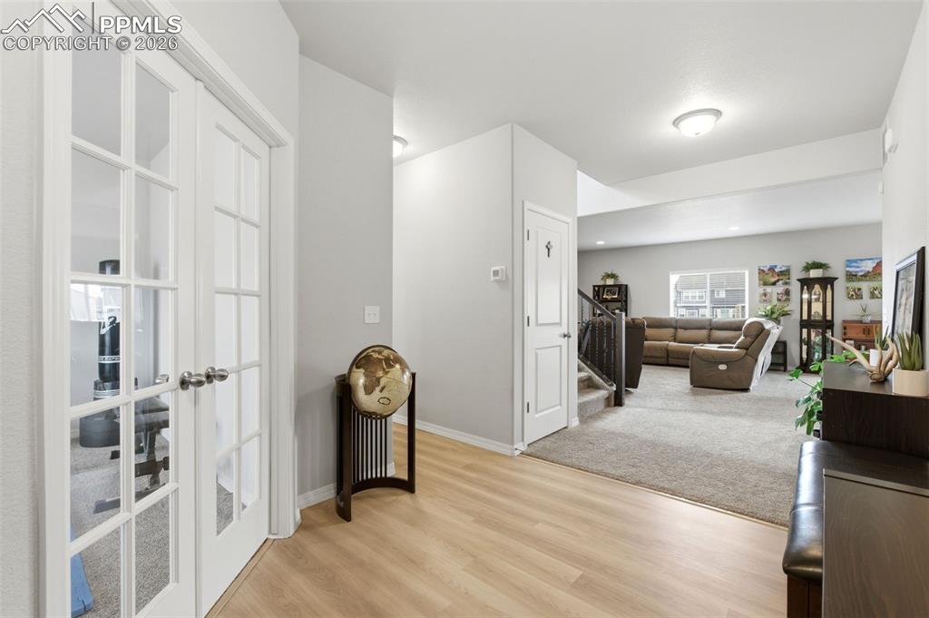 Image 5 of 47: Entry showing office on main floor