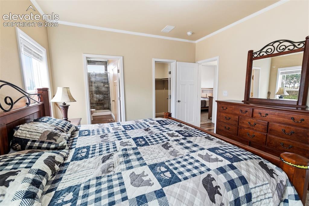 Image 12 of 30: Master Bedroom