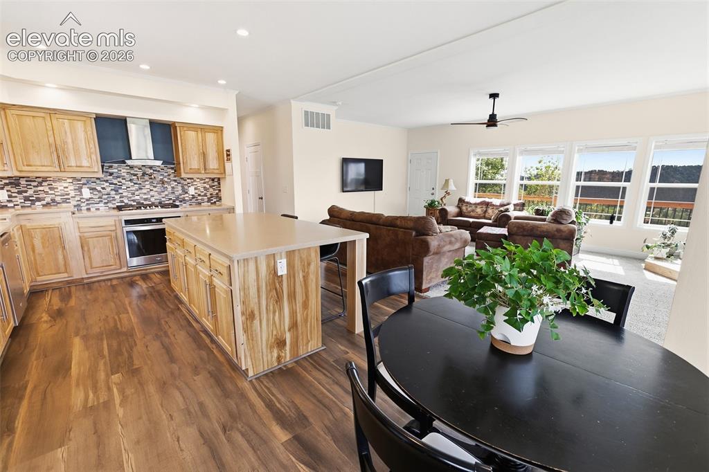 Image 9 of 30: Kitchen, Dining & Living