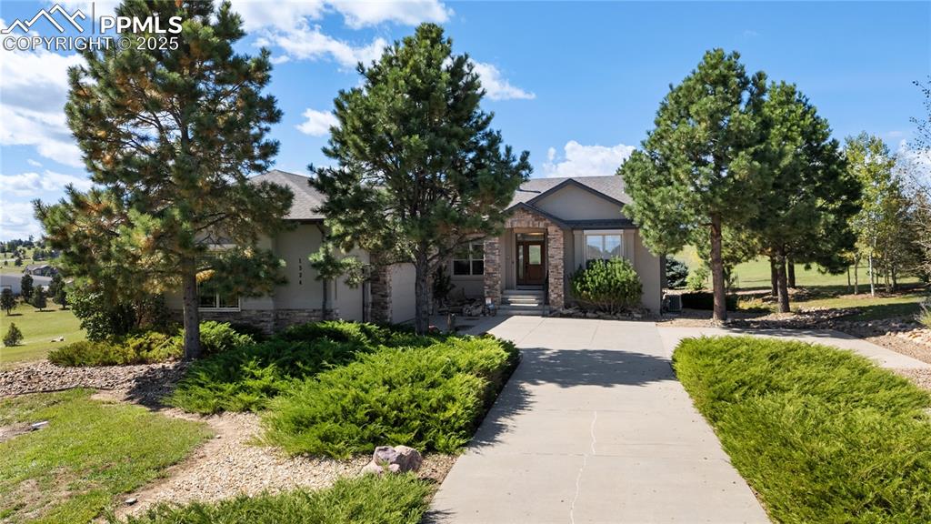 Image 2 of 50: Long driveway with added parking