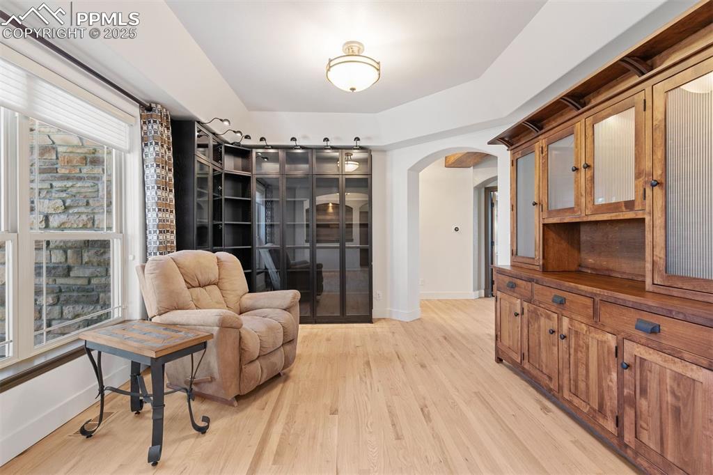 Image 23 of 50: This space is perfect for a library, dining room or home office