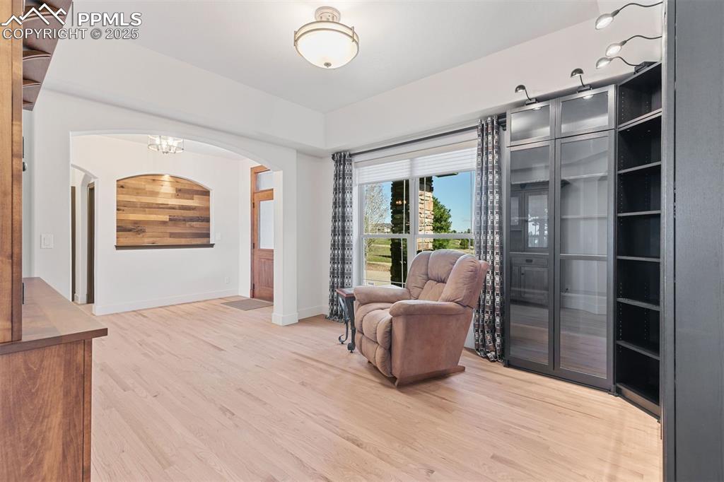 Image 24 of 50: Built in lighted cabinets