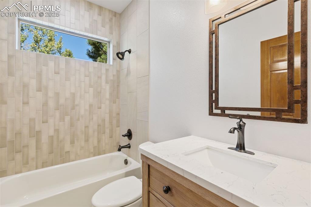 Image 31 of 50: Main level full bathroom-newly remodled