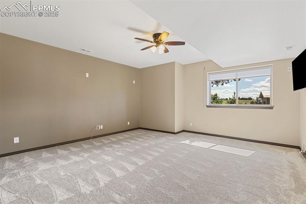 Image 48 of 50: Basement bedroom