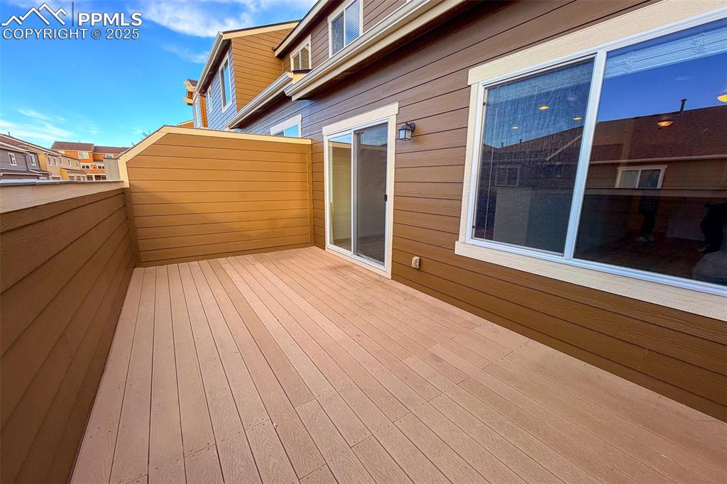 Image 12 of 22: Private enclosed deck off of kitchen-19 x 10