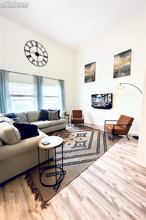 Image 2 of 22: Main level Family Room w/Sellers decor prior to move out