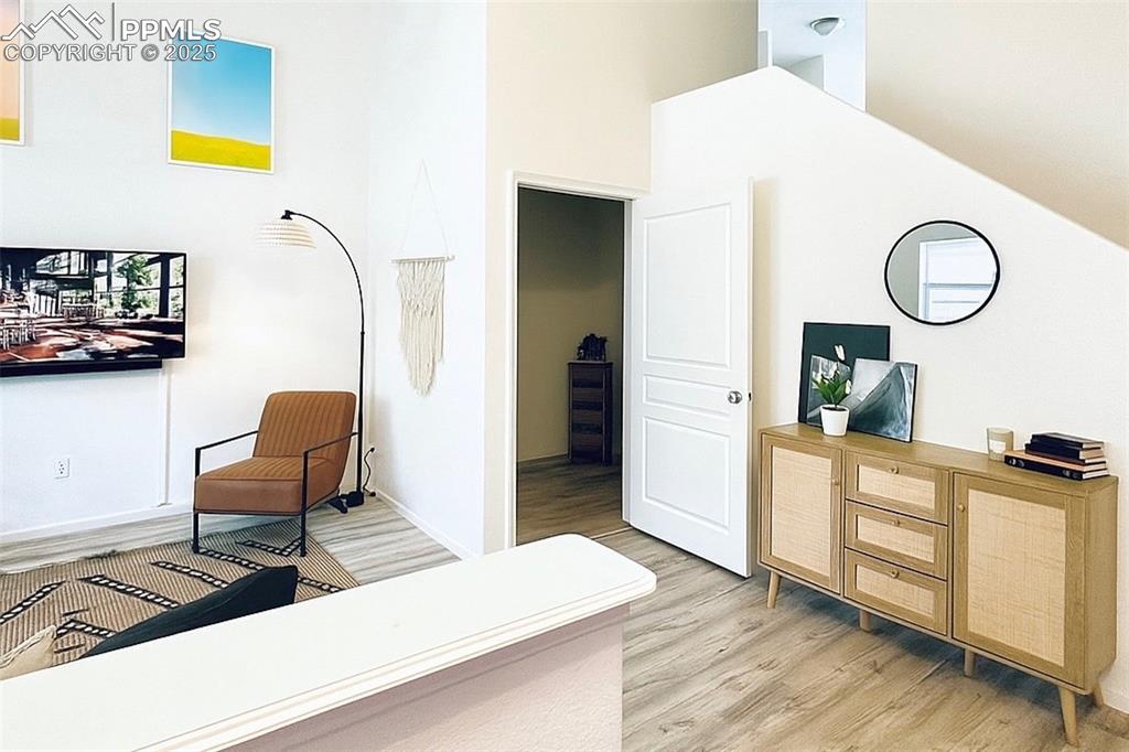 Image 3 of 22: Main Level Family Rm w/ Sellers decor prior to move out