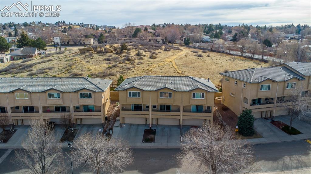 Image 2 of 30: Backs to open space with no homes behind.