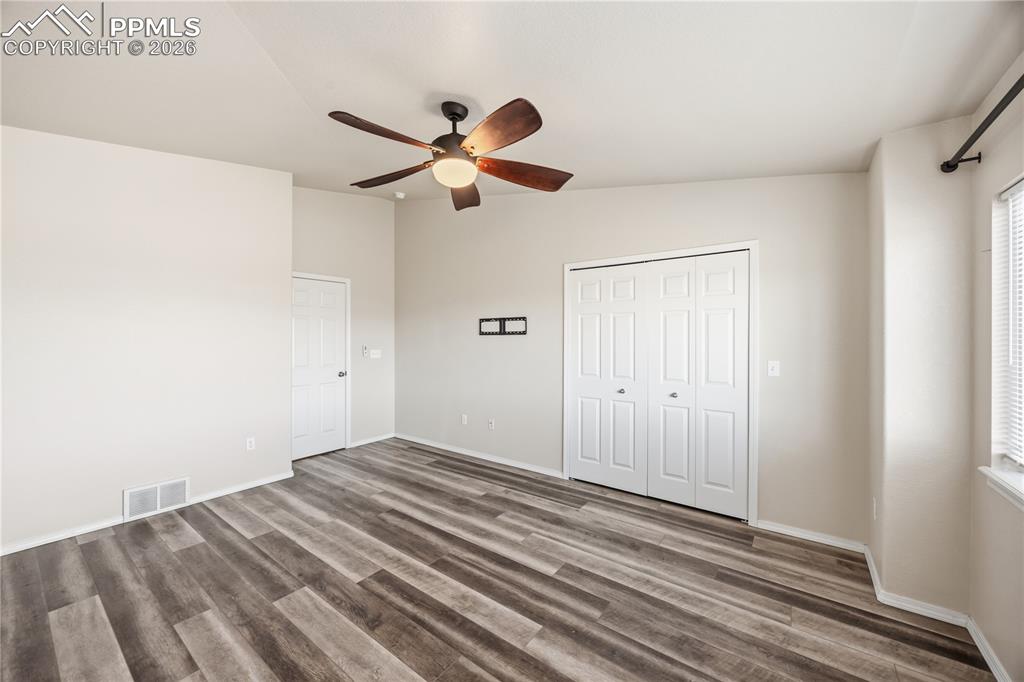 Image 22 of 30: Upper Level Primary Bedroom.
