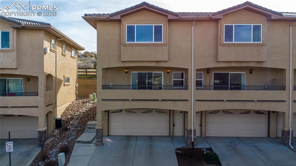 Image 3 of 30: Corner Lot with 2-car attached garage and private balcony.