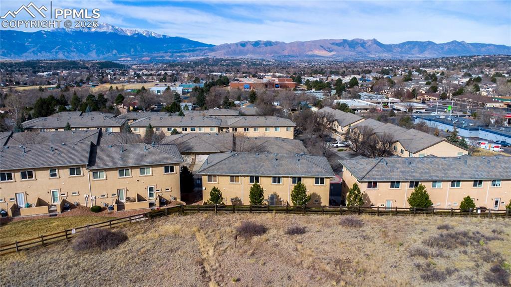 Image 30 of 30: Aerial view of community, open space, and Pikes Peak views.