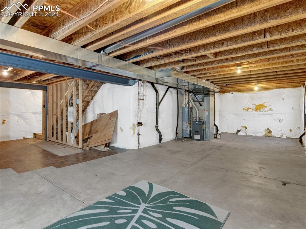 Image 23 of 23: Unfinished basement 