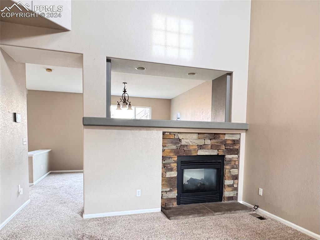 Image 3 of 23: Double sided fireplace
