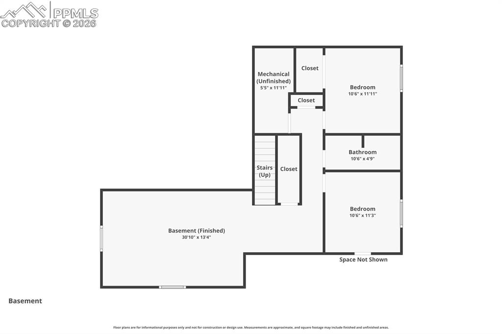 Image 49 of 50: Expansive retail complex featuring a large parking area, multiple storefron