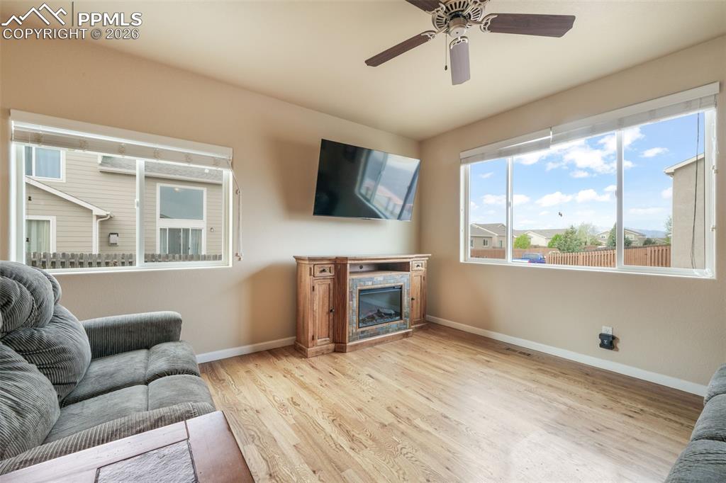 Image 8 of 50: Stucco exterior with stone accent detailing