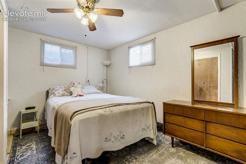 Image 31 of 45: Generously sized non-conforming basement bedroom.