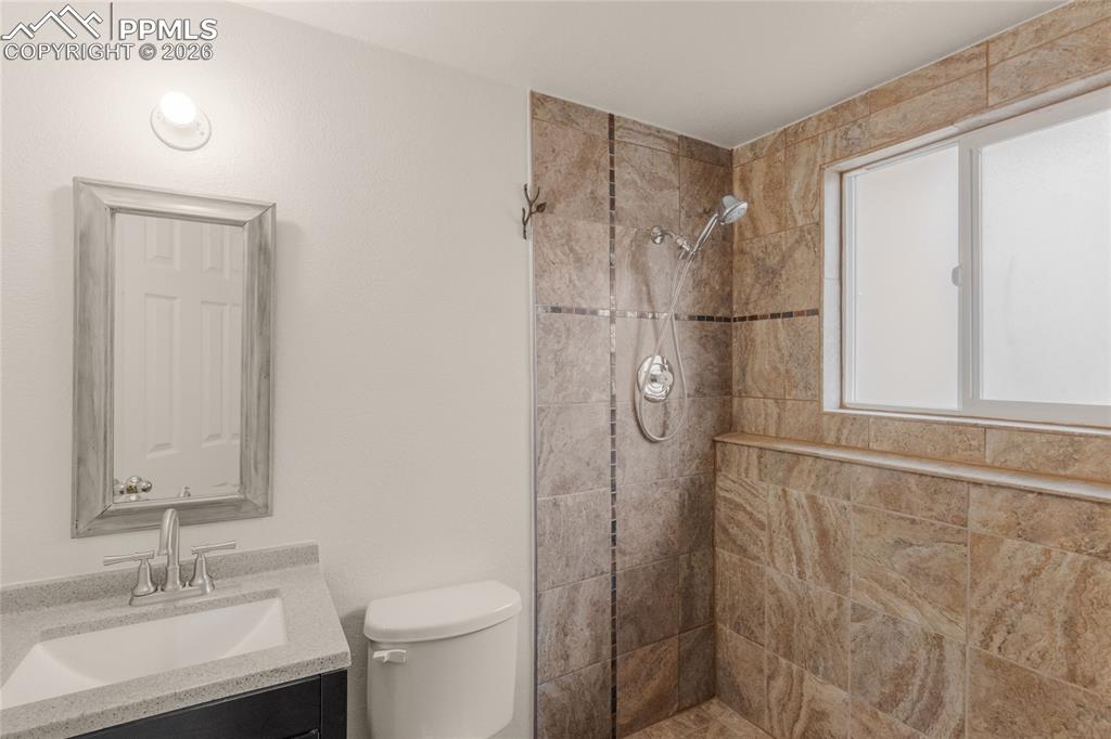 Image 27 of 36: Downstairs Bathroom