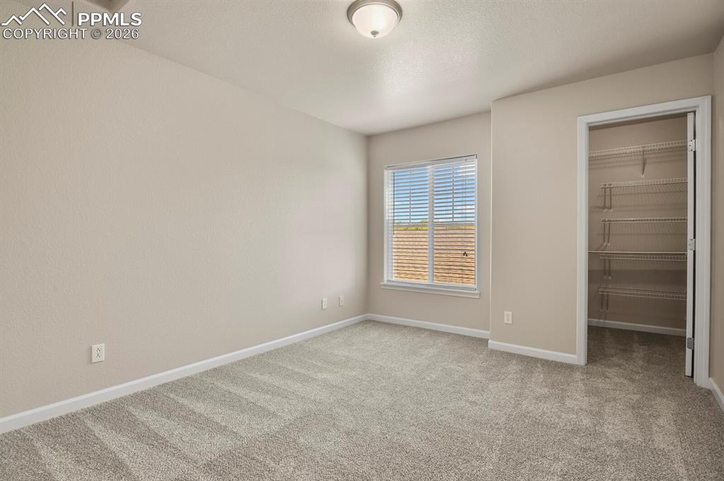 Image 22 of 31: Bedroom