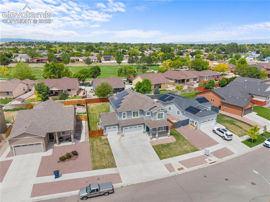 Image 39 of 42: Aerial perspective showcasing a residential neighborhood with varied archit
