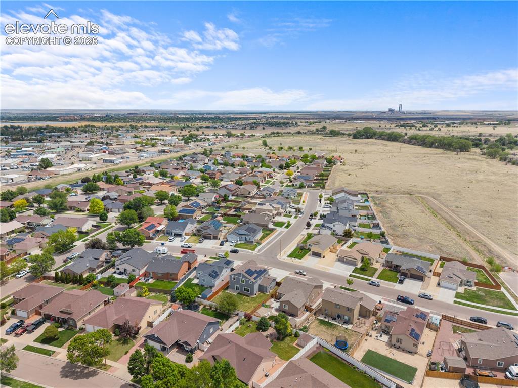 Image 41 of 42: Aerial perspective showcasing a residential neighborhood with varied archit